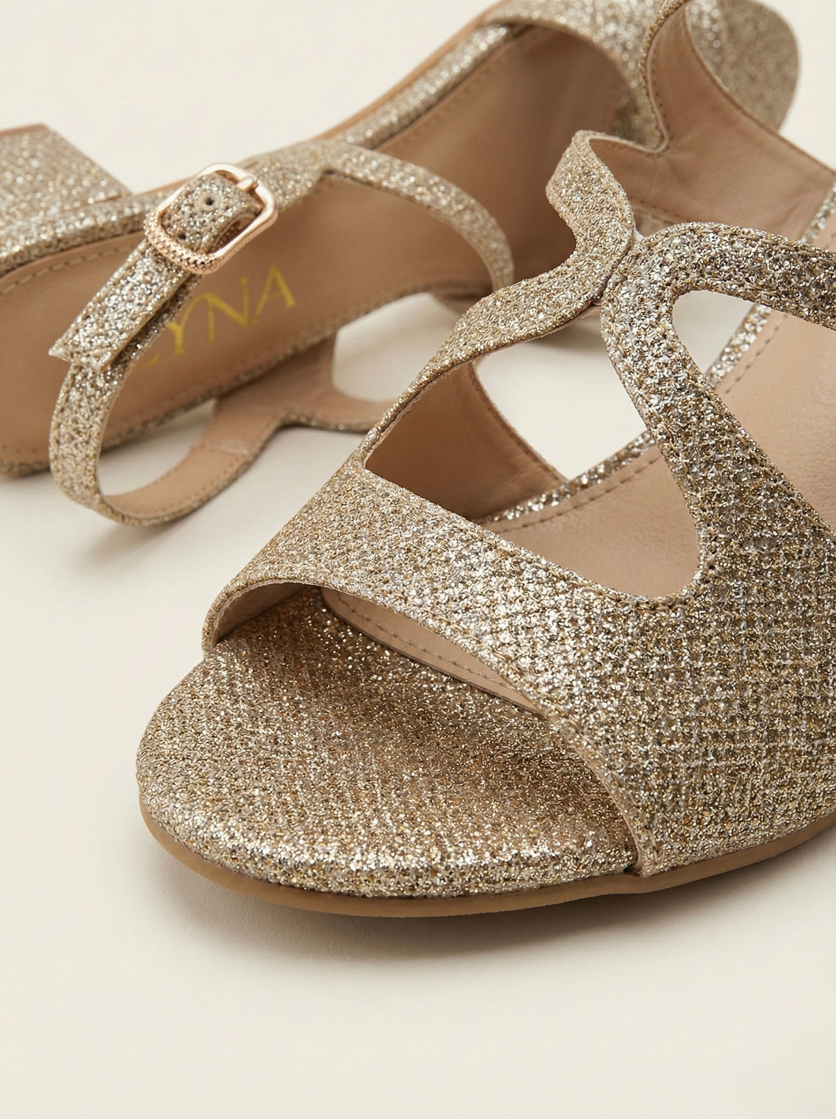 The Poeme Multi-Strap Mid-Block Heel